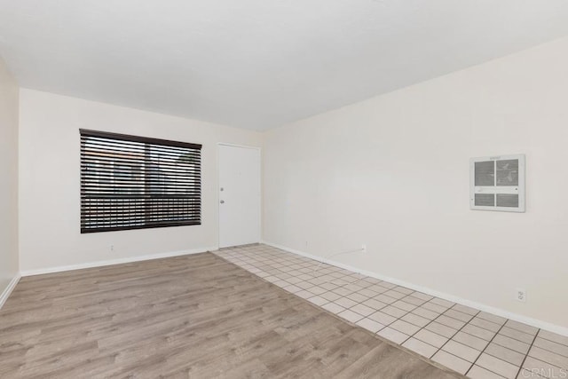 empty room with light wood-type flooring