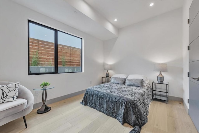 bedroom with light wood-type flooring