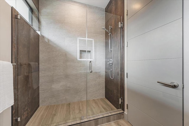 bathroom featuring walk in shower