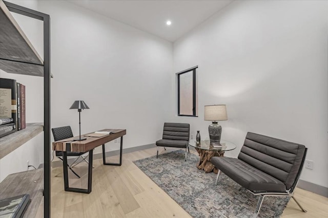 sitting room with light wood-type flooring