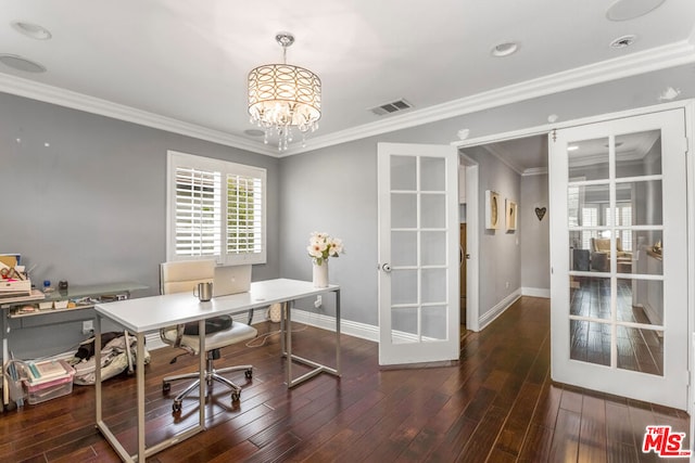 office space featuring dark wood-type flooring, ornamental molding, an inviting chandelier, and french doors