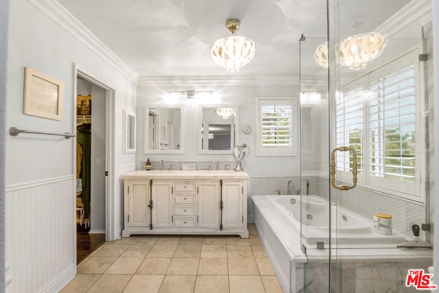 bathroom featuring crown molding, tile patterned flooring, vanity, a notable chandelier, and a bathing tub