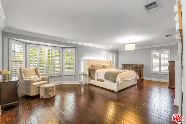 bedroom with crown molding and dark wood-type flooring