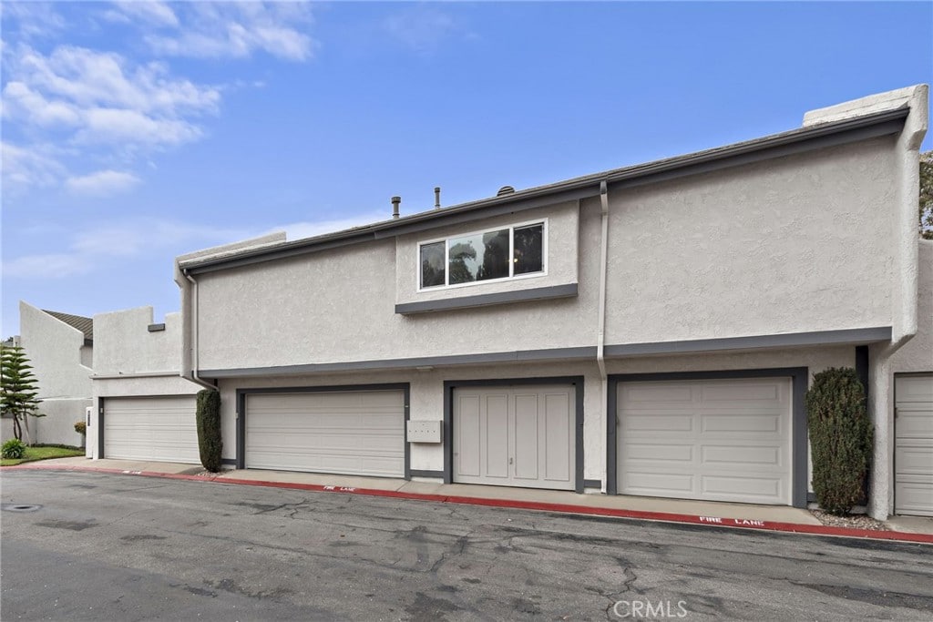 exterior space with a garage