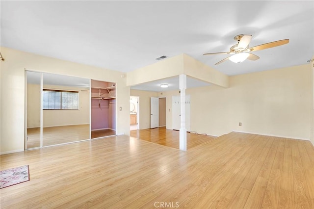 interior space featuring light hardwood / wood-style floors and ceiling fan