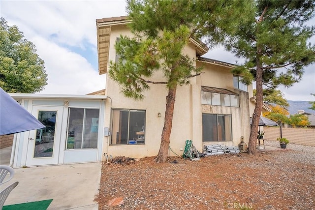 rear view of house with a patio area