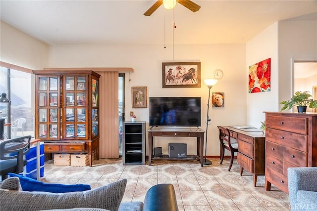 tiled living room featuring ceiling fan