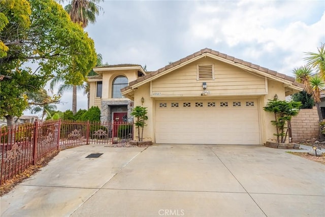 view of front of property featuring a garage