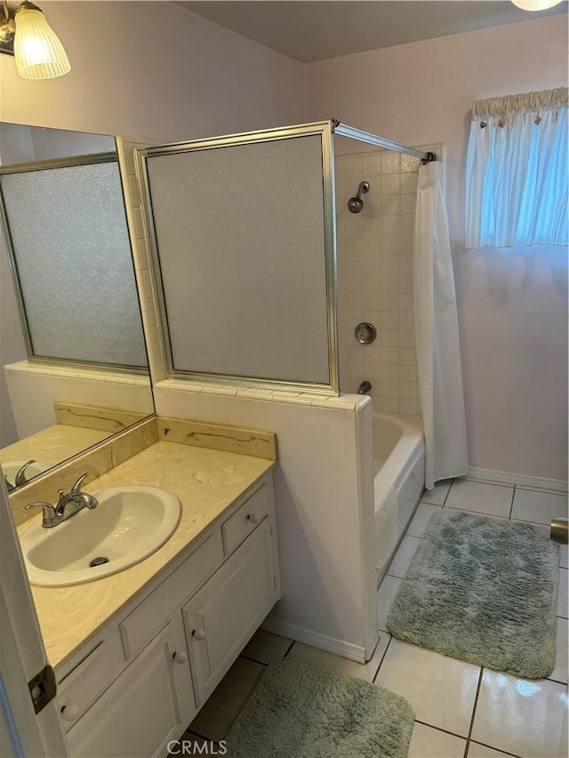 bathroom with vanity, shower / tub combo, and tile patterned floors