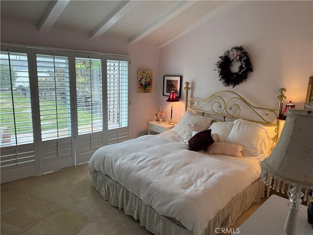 bedroom featuring light carpet, vaulted ceiling with beams, and access to outside