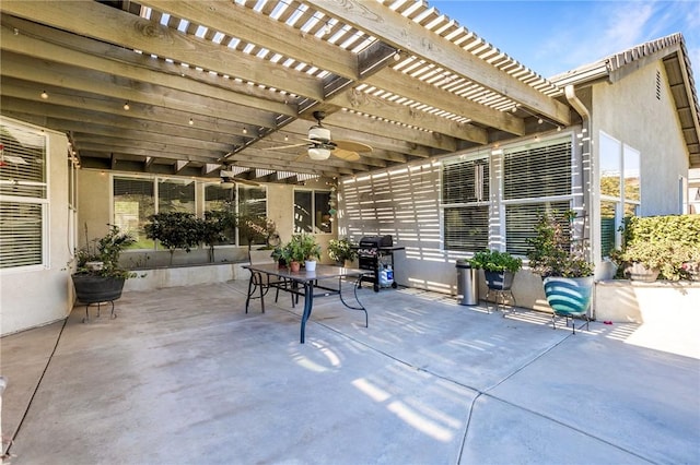 view of patio / terrace with ceiling fan, grilling area, a pergola, and outdoor dining space