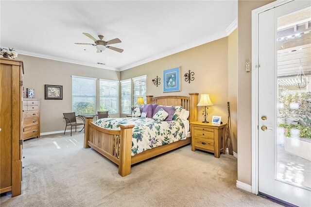 carpeted bedroom featuring crown molding, access to outside, and ceiling fan