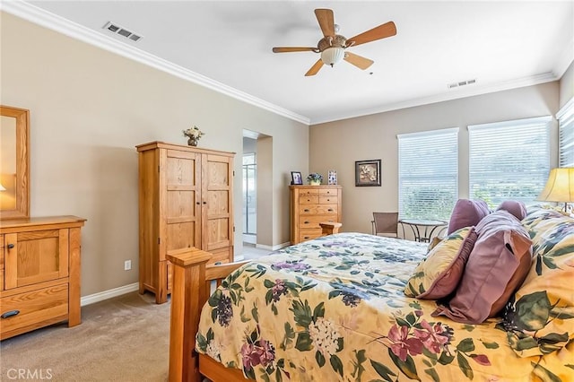 bedroom featuring light carpet, baseboards, visible vents, and ornamental molding