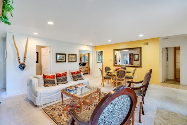 living room featuring light colored carpet