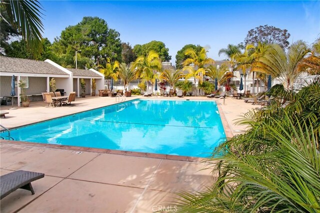 view of pool featuring a patio