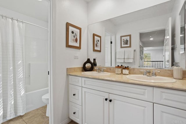 full bathroom featuring tile patterned floors, toilet, shower / tub combo, and vanity