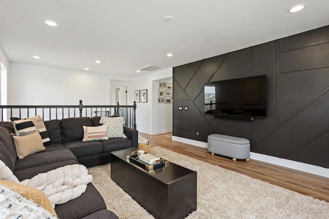 living room with wood-type flooring