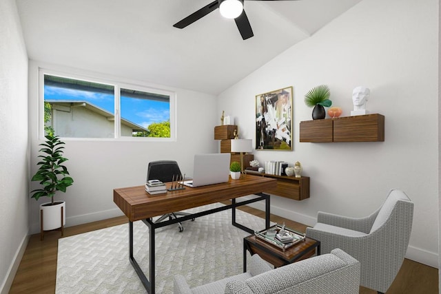 office with vaulted ceiling, hardwood / wood-style floors, and ceiling fan