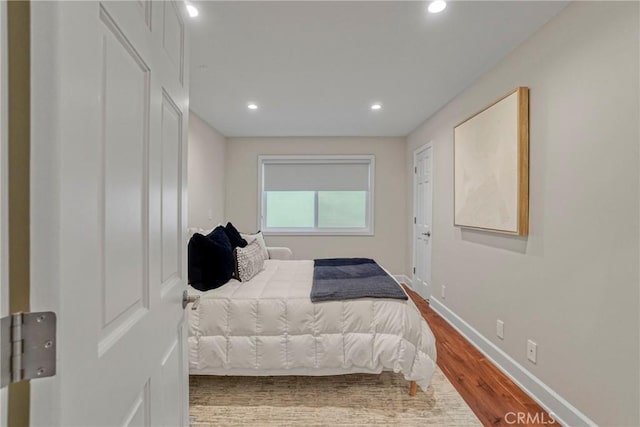 bedroom featuring hardwood / wood-style flooring