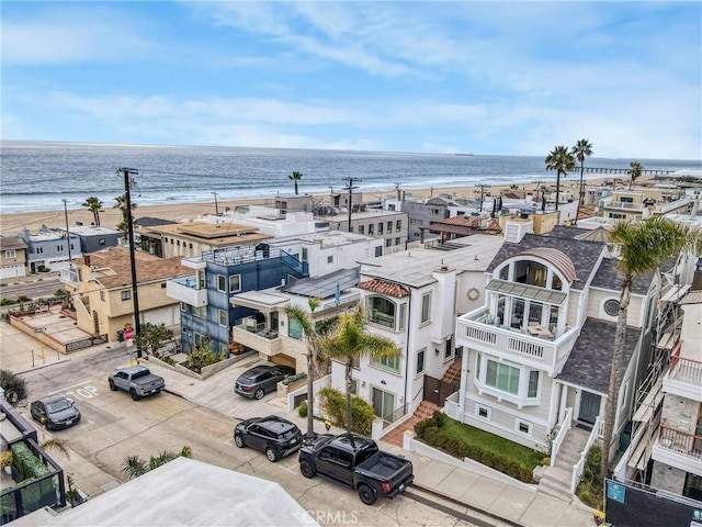 aerial view with a beach view and a water view