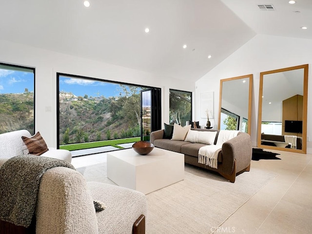 bedroom featuring access to exterior and high vaulted ceiling