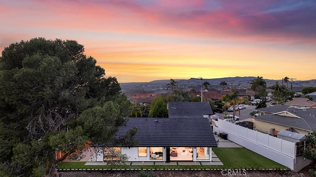 aerial view at dusk with a mountain view