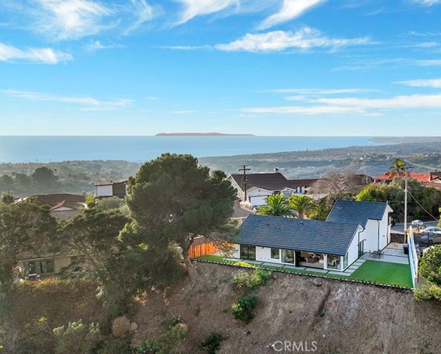 bird's eye view with a water view