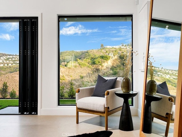 living area featuring plenty of natural light