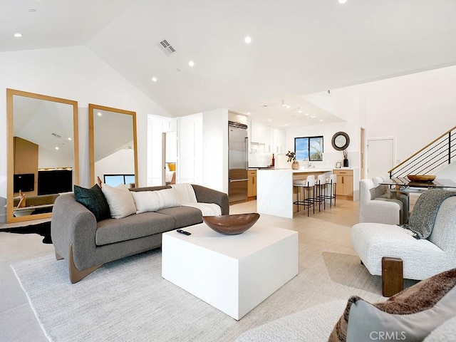 living room with lofted ceiling