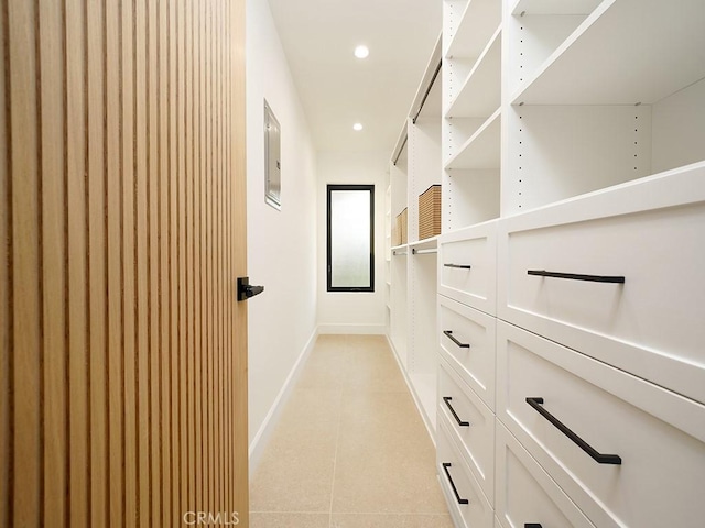 spacious closet with light tile patterned flooring