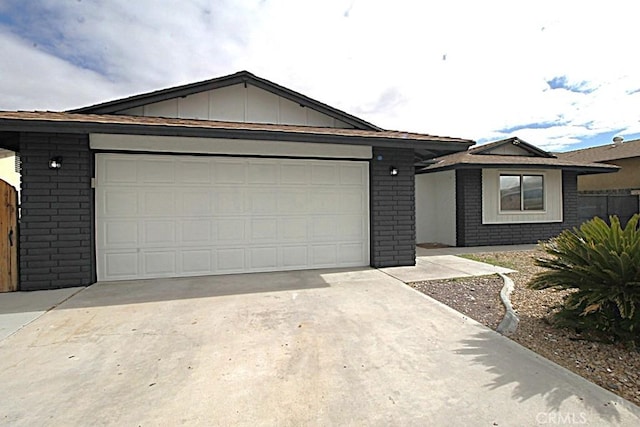 single story home with a garage