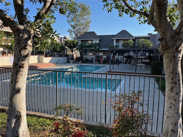 view of pool with a patio and a gazebo