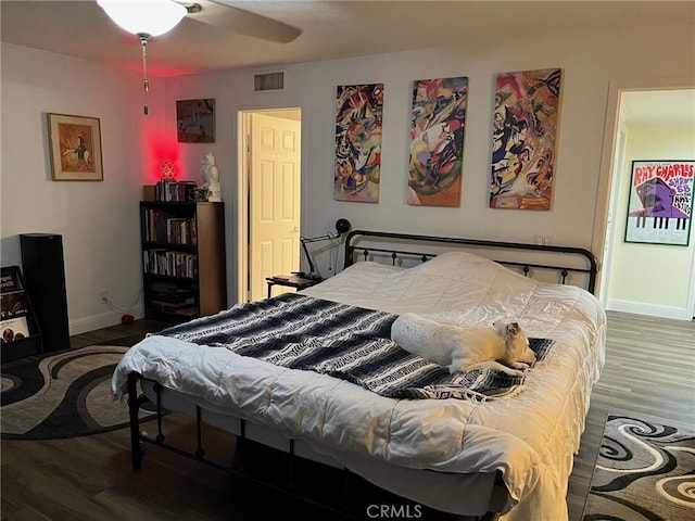 bedroom with wood-type flooring