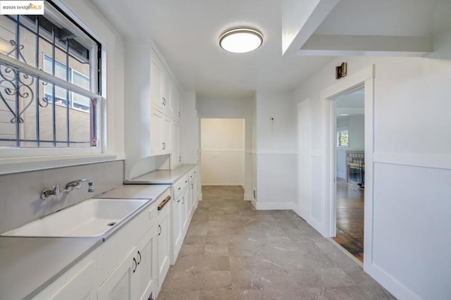 interior space with sink and a wealth of natural light