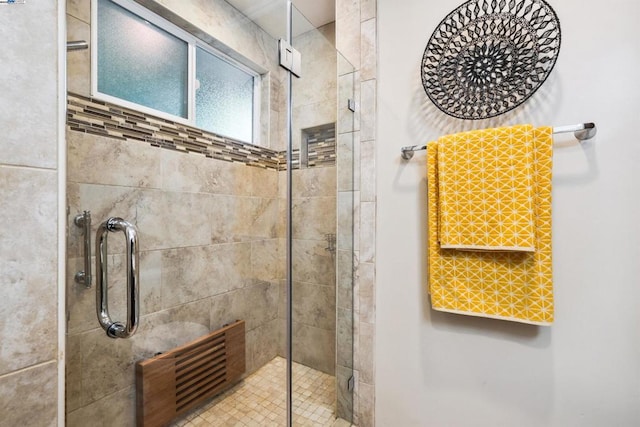 bathroom featuring an enclosed shower