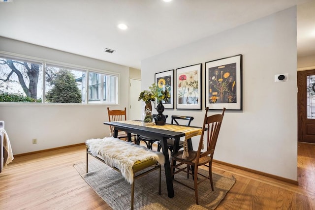 dining area featuring light hardwood / wood-style floors