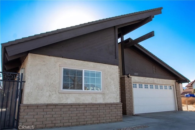 view of home's exterior featuring a garage