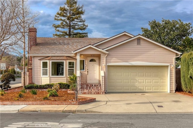 ranch-style house featuring a garage