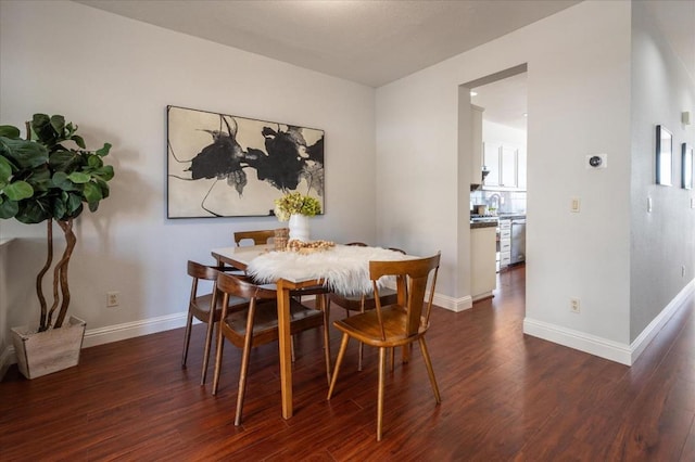 dining room with dark wood-type flooring