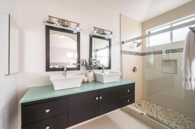 bathroom featuring vanity and walk in shower