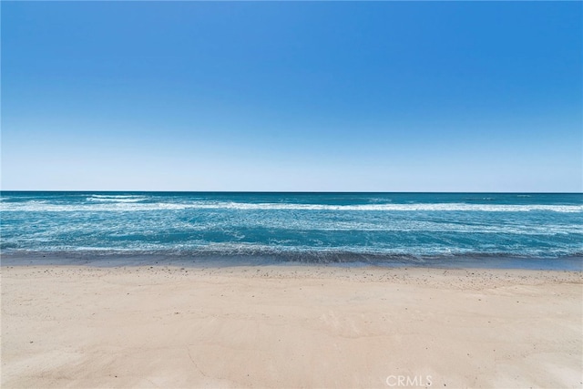 property view of water featuring a view of the beach