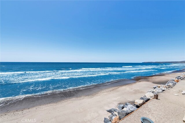 property view of water with a beach view