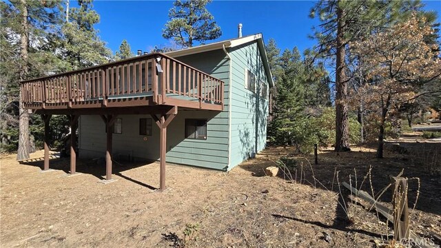 rear view of house with a deck