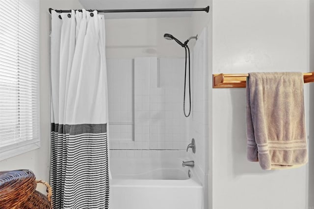 bathroom featuring shower / tub combo