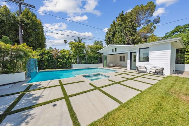 view of pool with a lawn, an outdoor living space, a patio area, an outbuilding, and an in ground hot tub