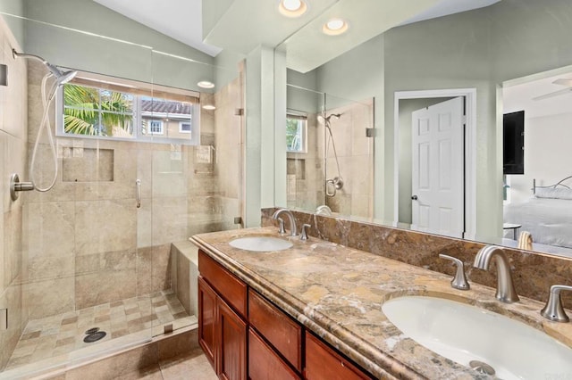 bathroom featuring a healthy amount of sunlight and an enclosed shower