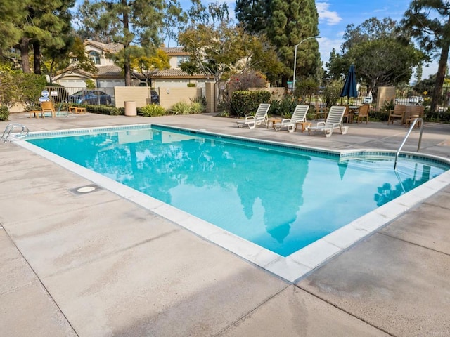 view of pool featuring a patio area