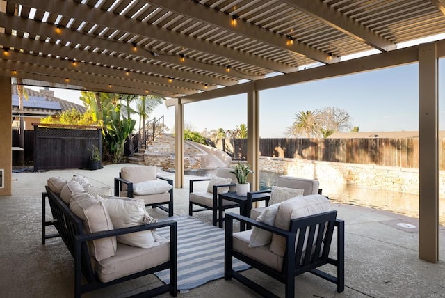 view of patio / terrace featuring outdoor lounge area and a pergola