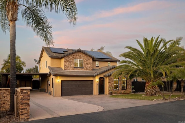 view of front of home with a garage