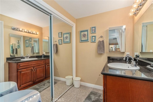 bathroom with vanity and tile patterned floors